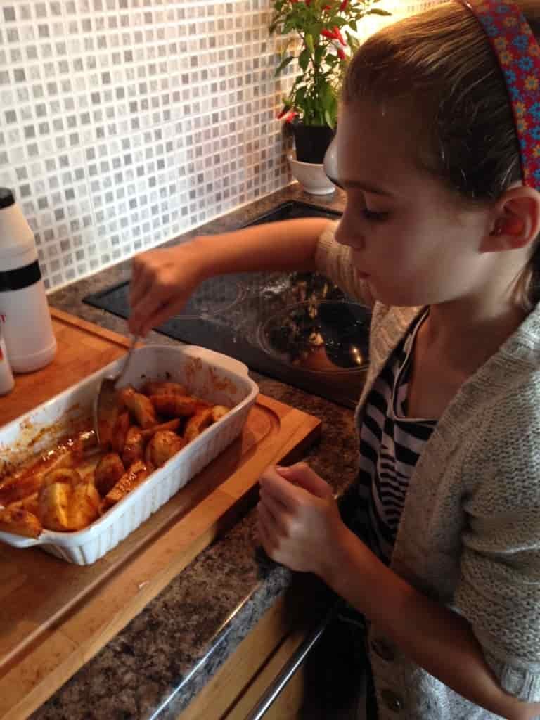 marinating the potato wedges