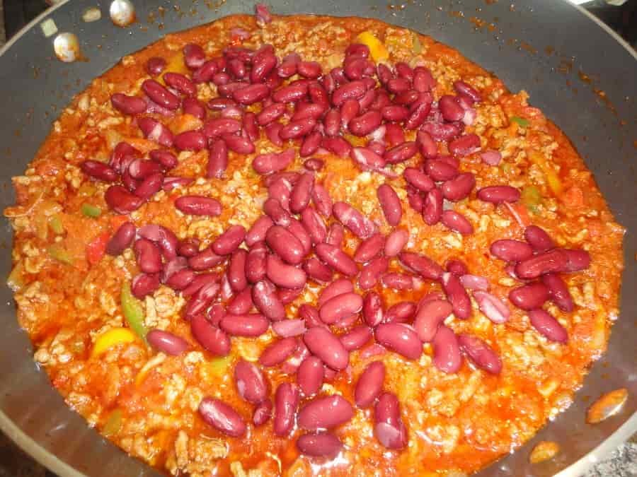 This Mexican beef and bean burrito is a cheap, easy to make recipe that is perfect for a Saturday night with the family. Delicious!