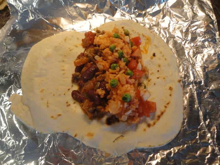 This Mexican beef and bean burrito is a cheap, easy to make recipe that is perfect for a Saturday night with the family. Delicious!