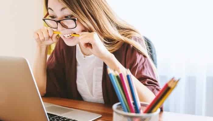 woman studying with a laptop