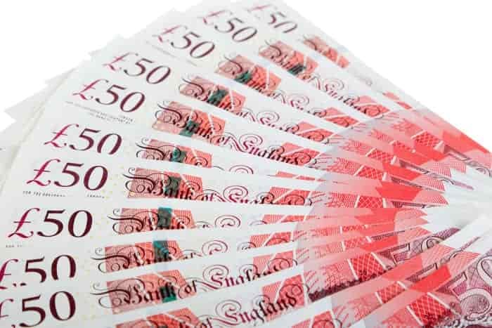 close up of fifty pound notes