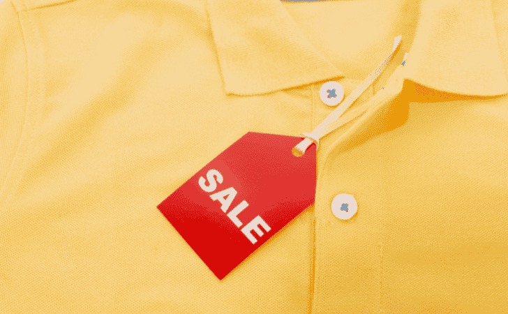 red sale lable on a yellow tshirt