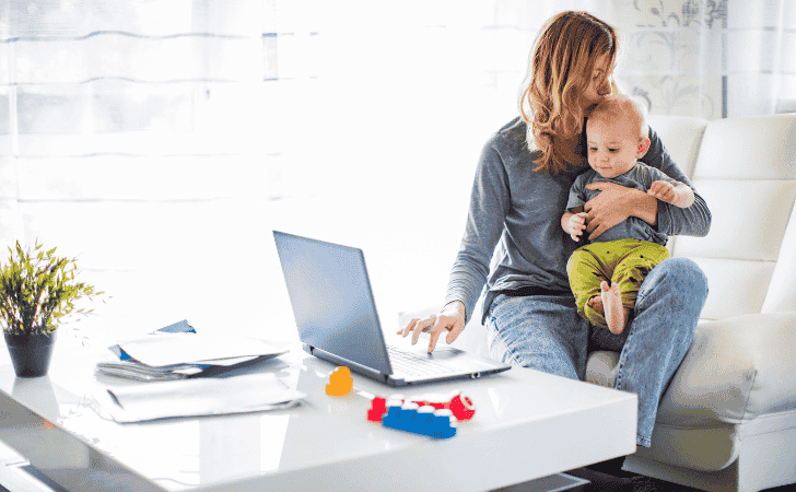 woman with baby while working