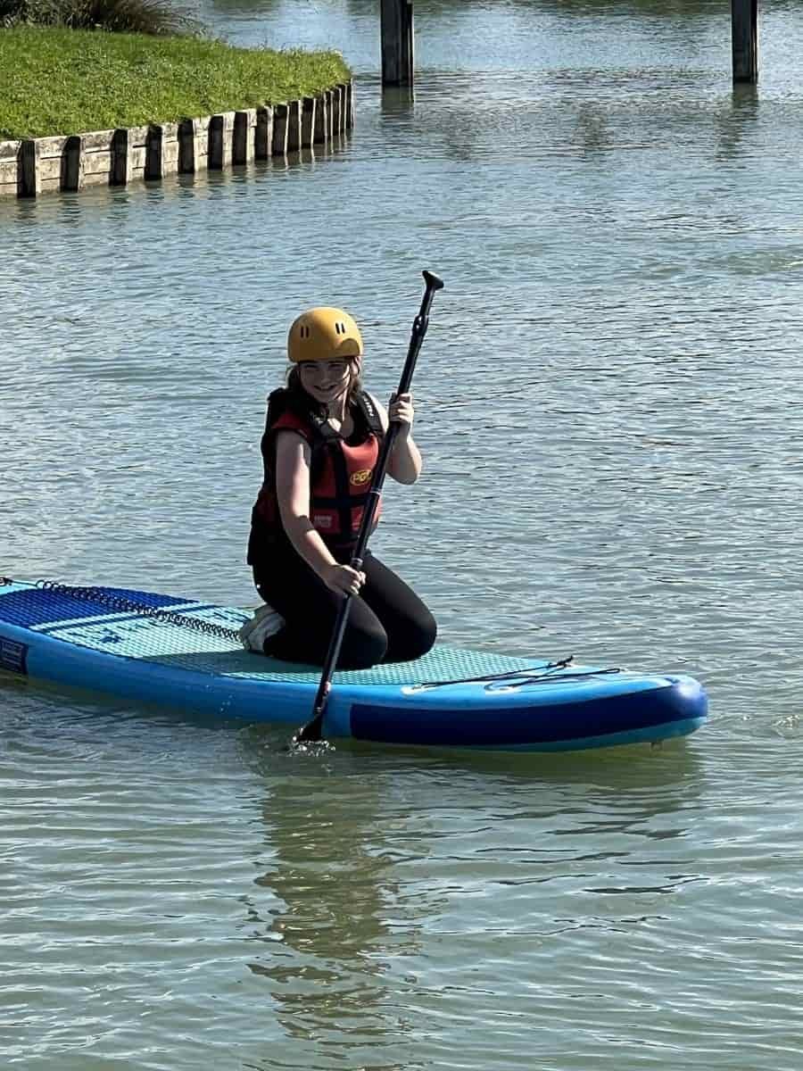 Chloe paddle boarding