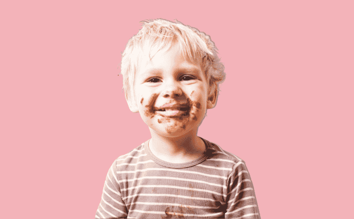young boy with chocolate around his face